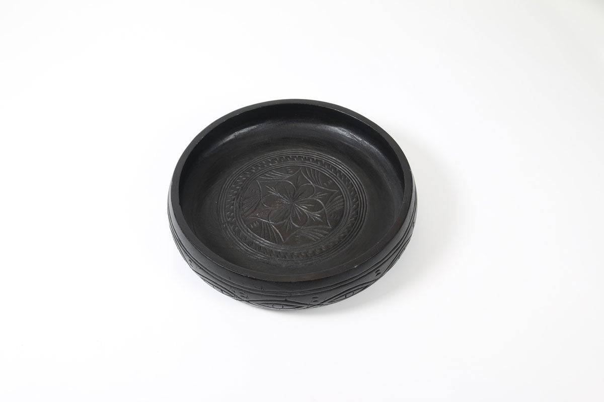 Intricately Carved Black Wooden Bowl