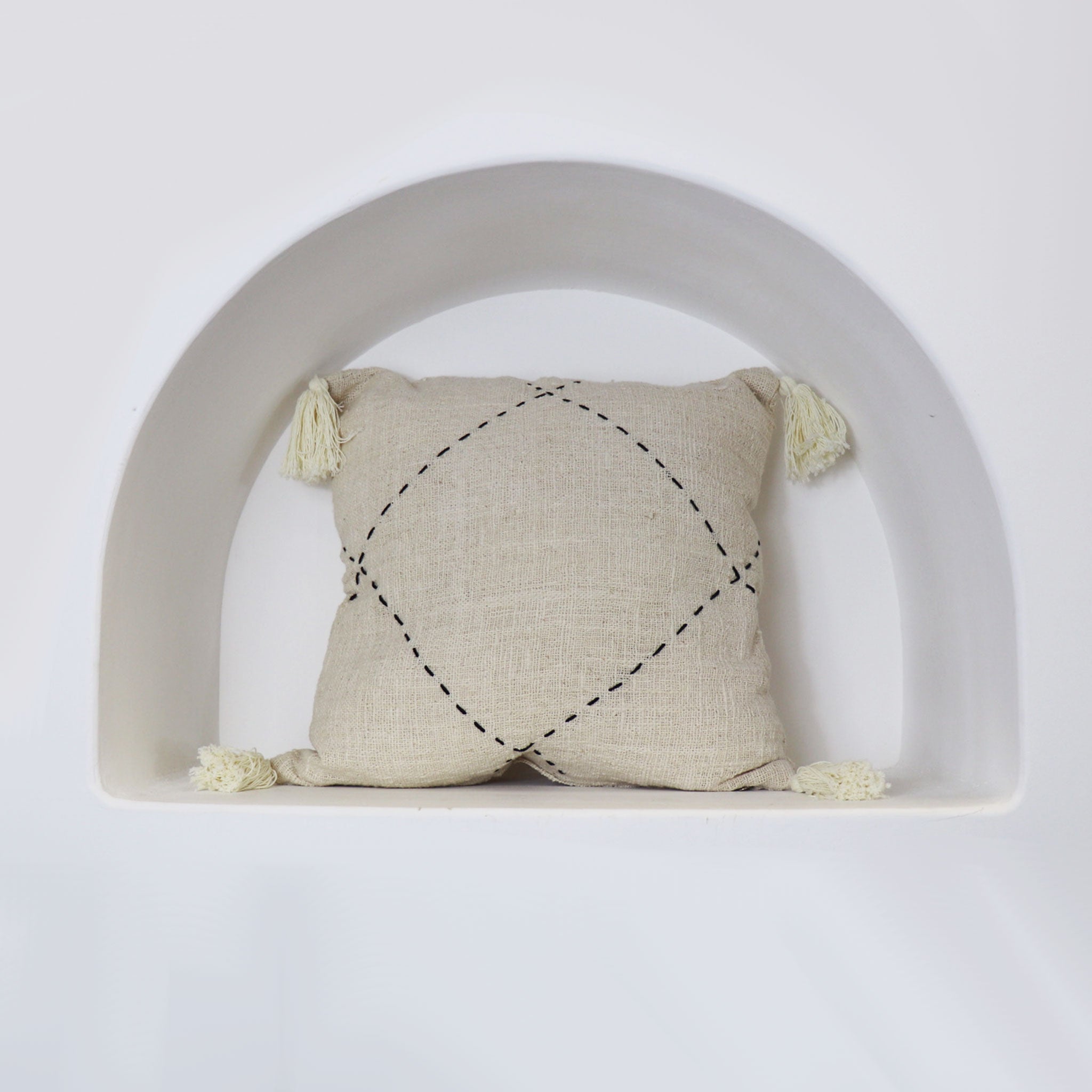 Natural Cotton Cushion Cover With Black Stitching And Cream Tassels
